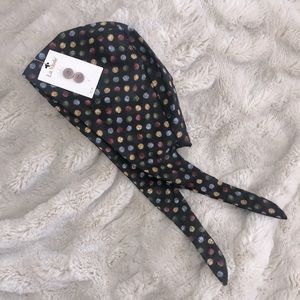 Scrub cap for men or women, with buttons.